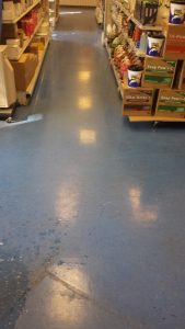 picture of store floor being cleaned
